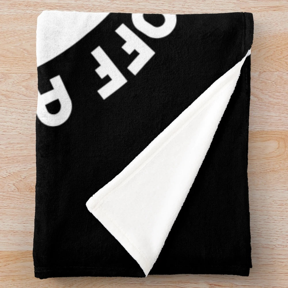 Plush blanket with "Have You Tried Turning It Off And On Again?" text