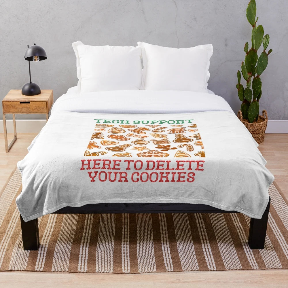Plush blanket featuring a tech support and programming-themed design