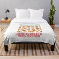 Plush blanket featuring a tech support and programming-themed design