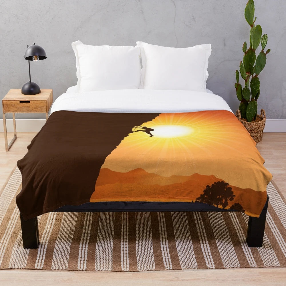Plush blanket with inspirational mountain climbing design