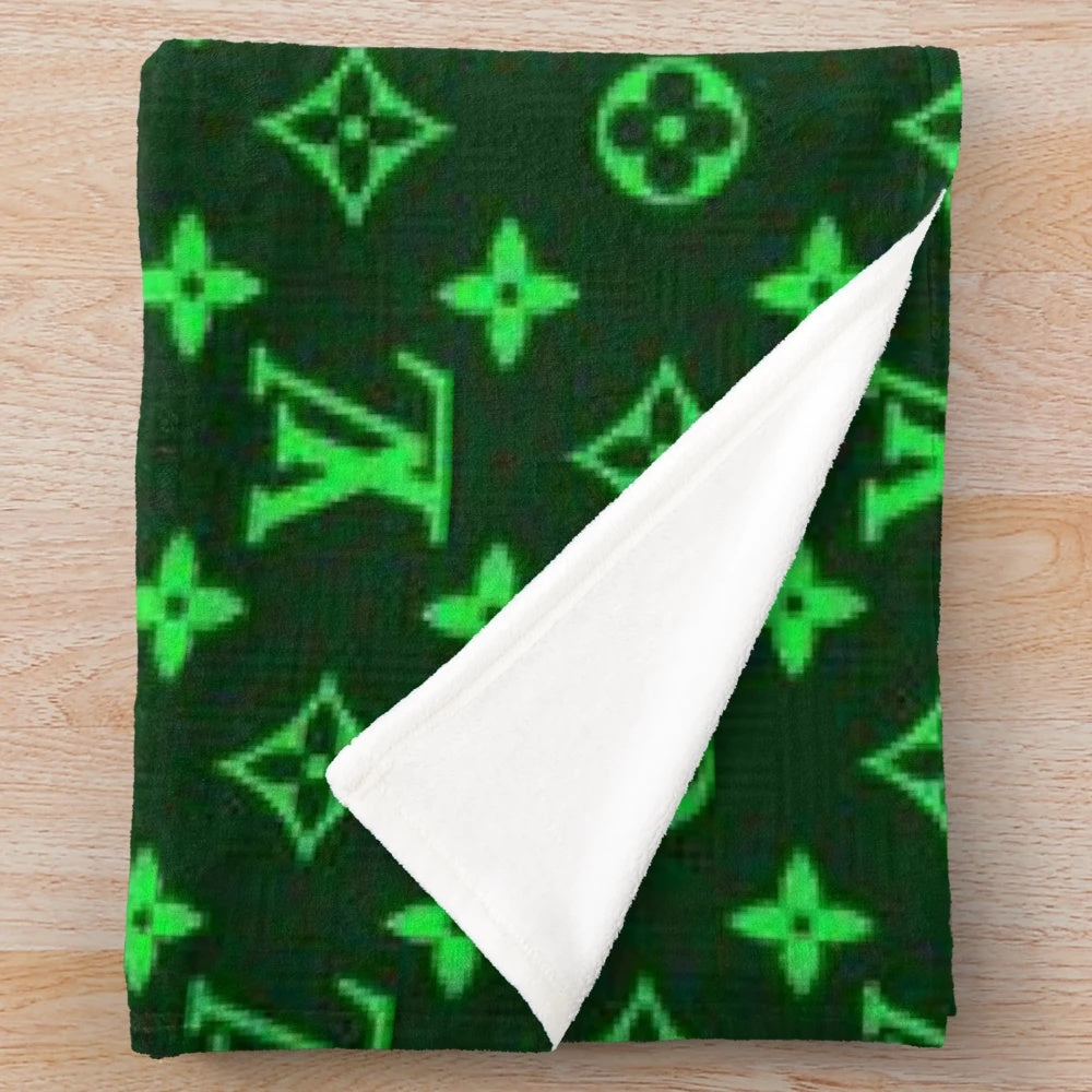 Plush blanket with an adventurous, outdoorsy design