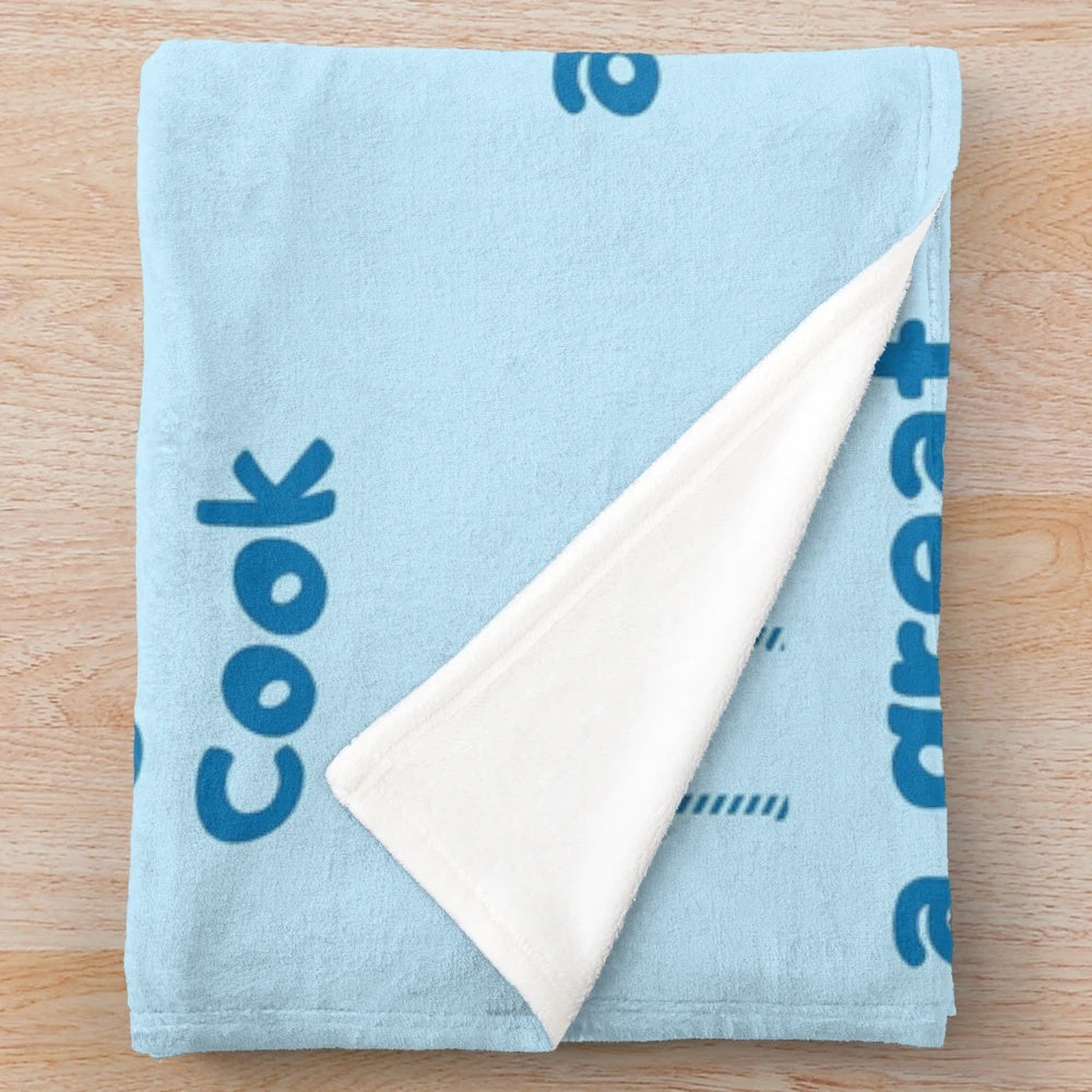 Plush blanket featuring a cooking or chef-themed design