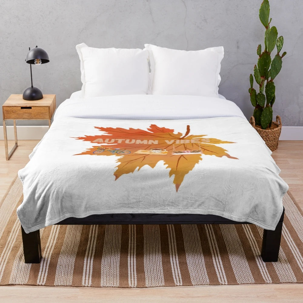 Soft and plush autumn-inspired blanket with leaf pattern