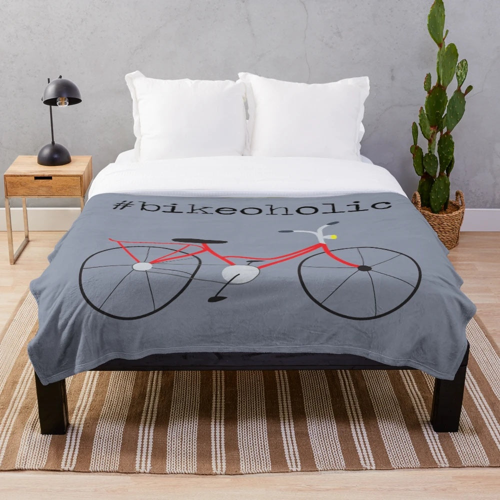 Plush blanket featuring a red bicycle design for bike lovers