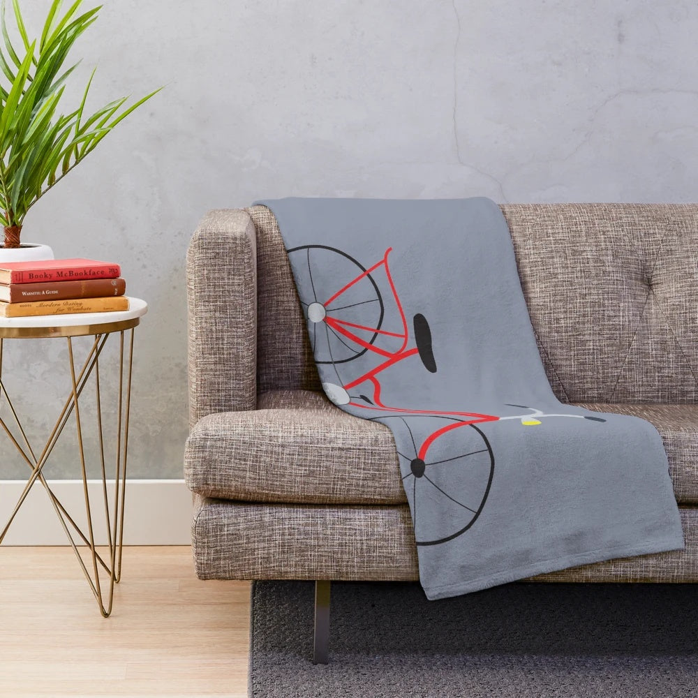 Plush blanket featuring a red bicycle design for bike lovers