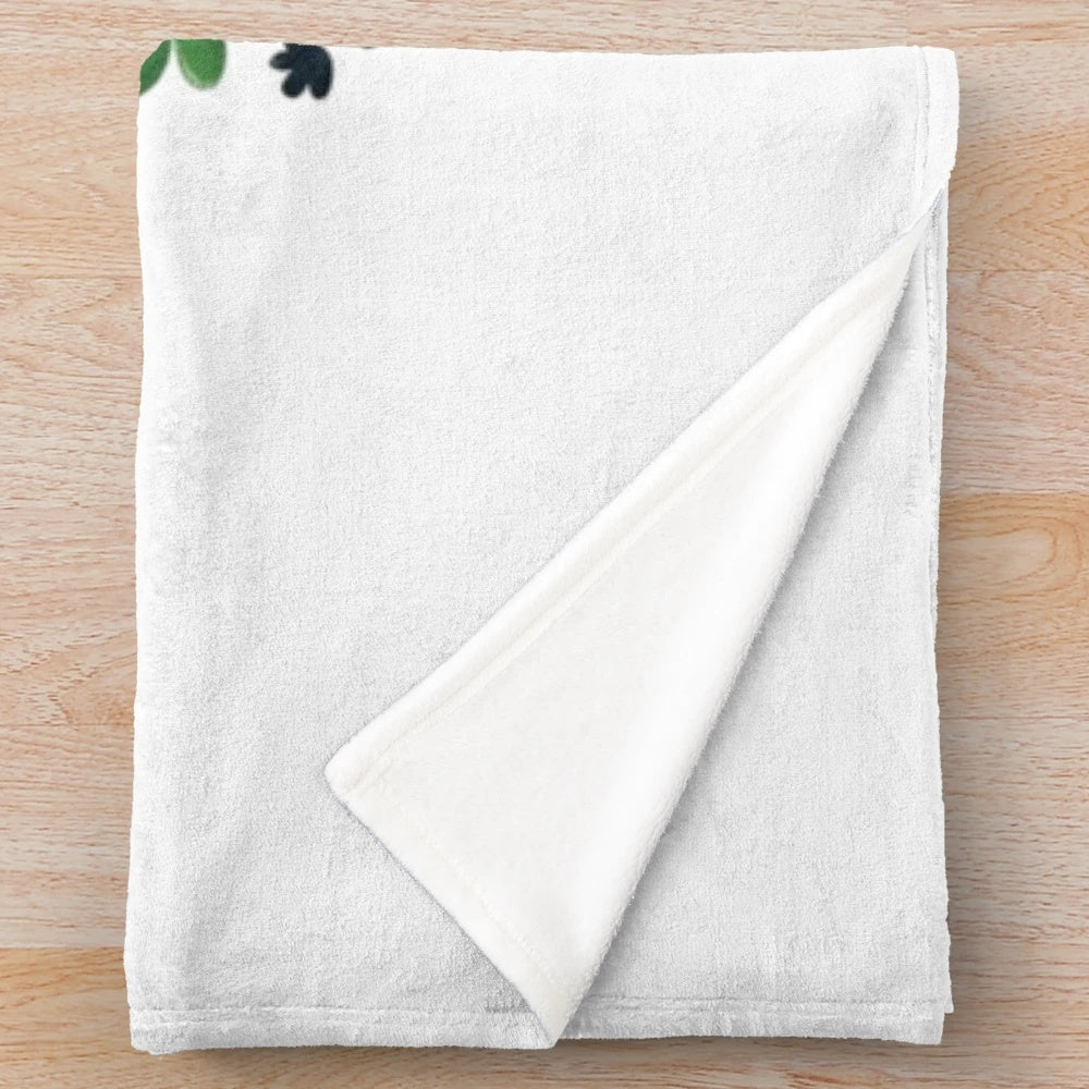 Cozy plush blanket featuring a bookworm design for book lovers