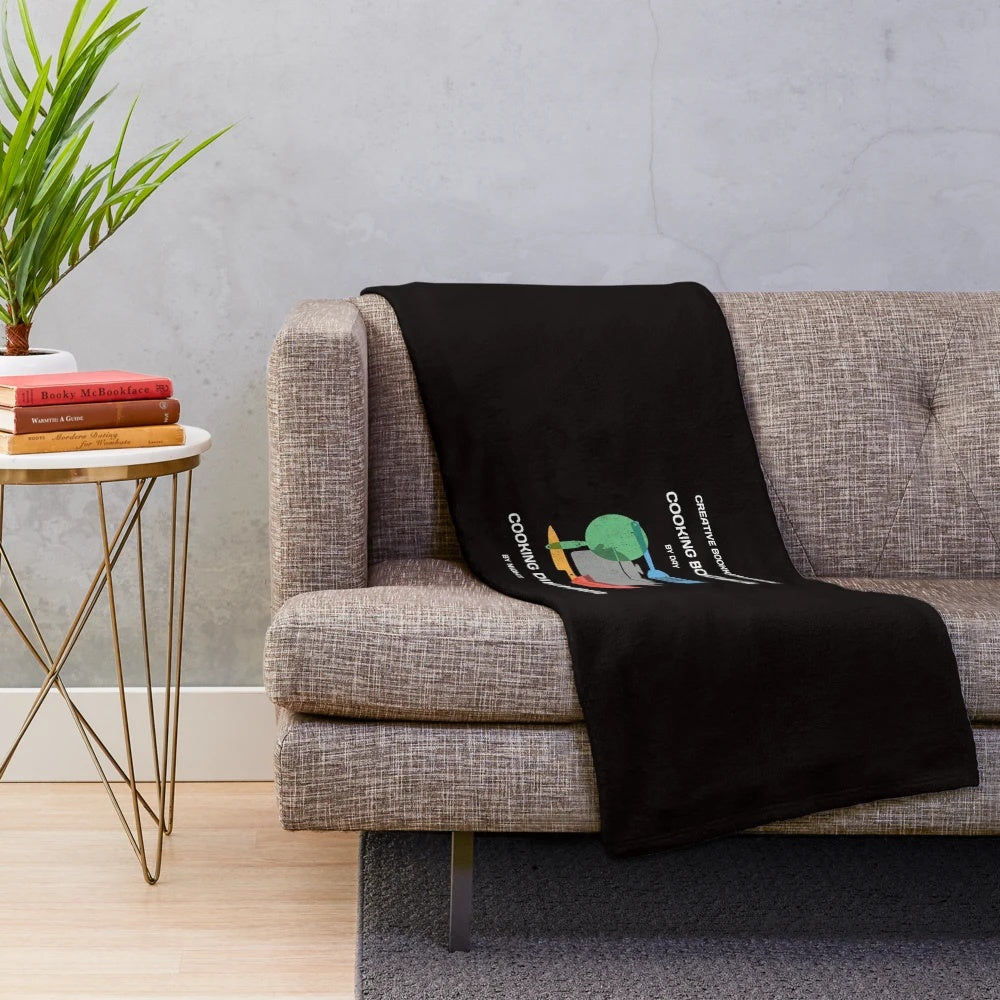 Cozy plush blanket featuring a bookkeeper cooking