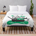 Plush blanket with travel and adventure inspired design
