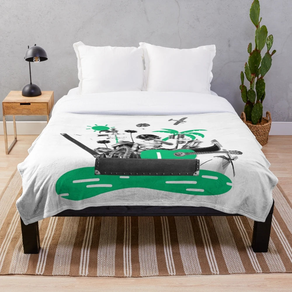 Plush blanket with travel and adventure inspired design