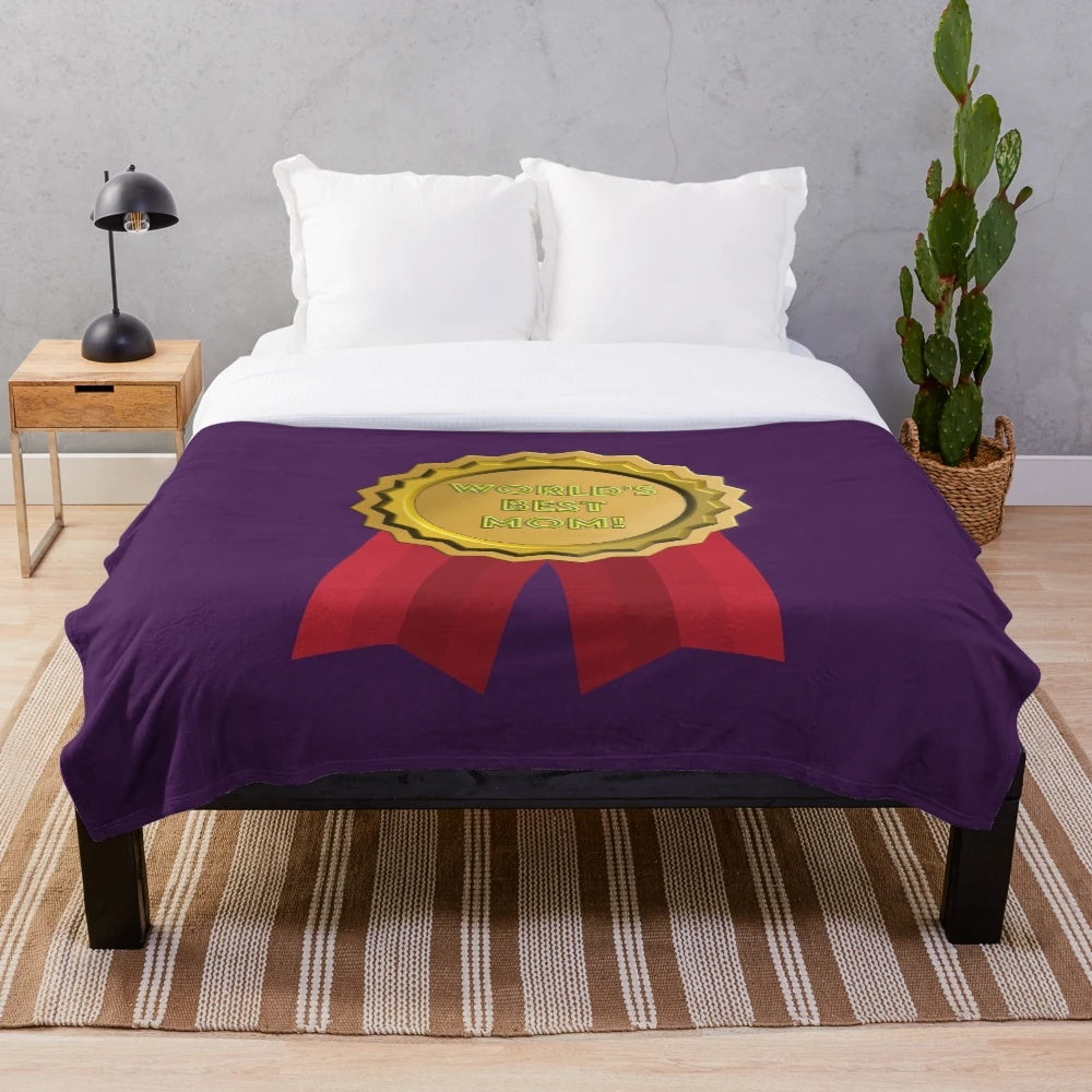 Plush blanket with "World's Best Mom" text