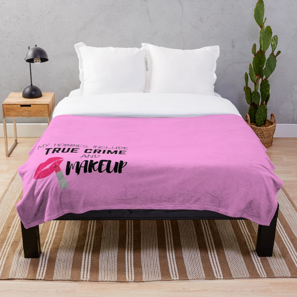 Plush blanket with text "My Hobbies Include True Crime and Makeup