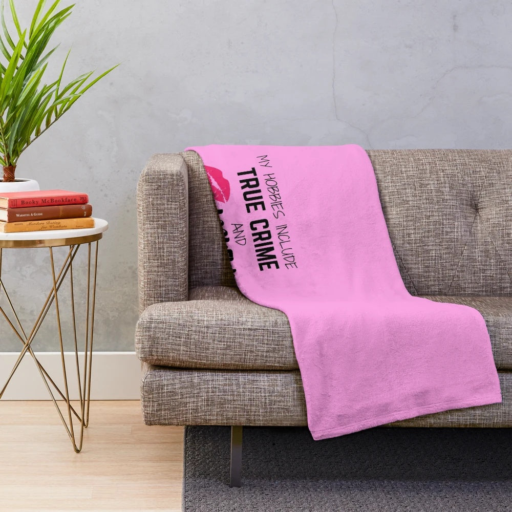 Plush blanket with text "My Hobbies Include True Crime and Makeup