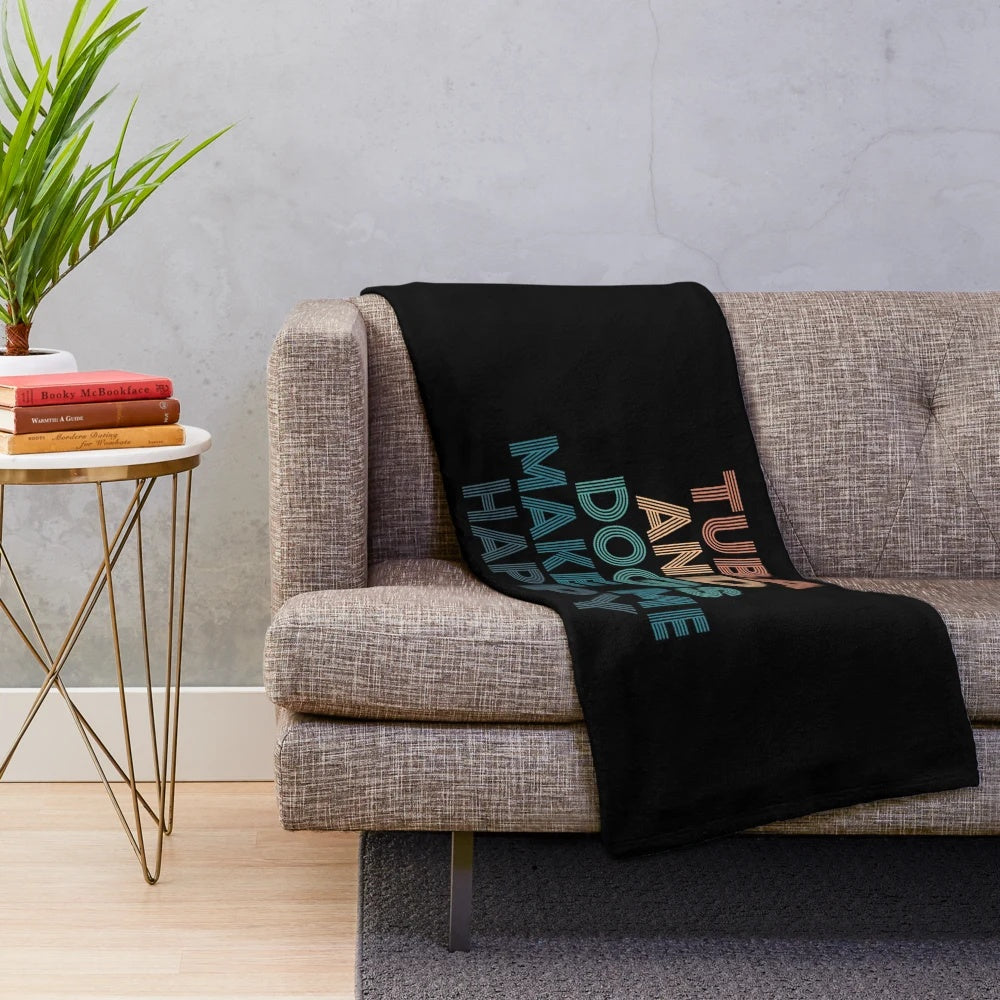 Plush blanket with "Tuba and Dogs Make Me Happy" design