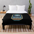 Plush blanket featuring a video game-inspired coffee theme design