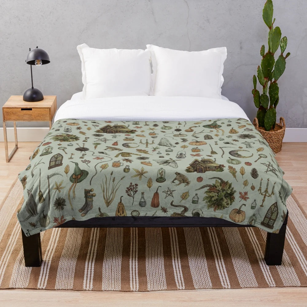 Cozy plush blanket with witchy, gothic, and occult nature-inspired design
