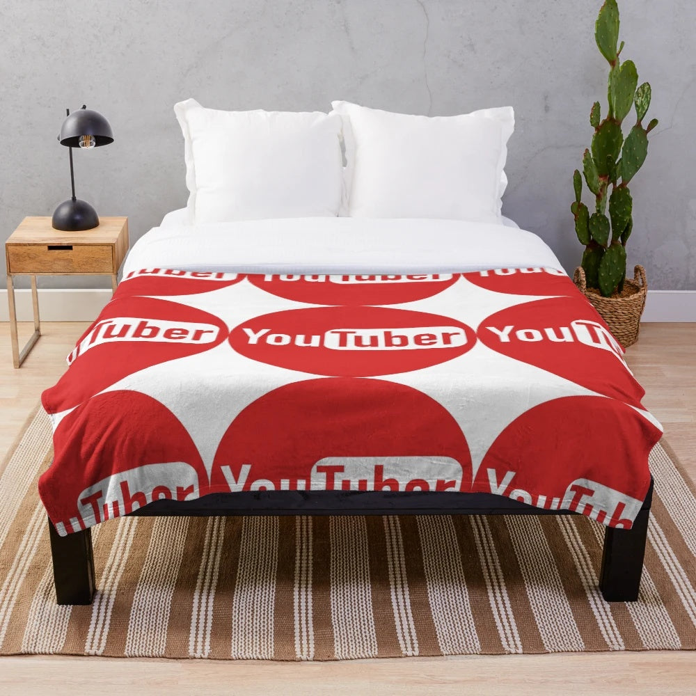 Cozy plush blanket featuring youtube creator design
