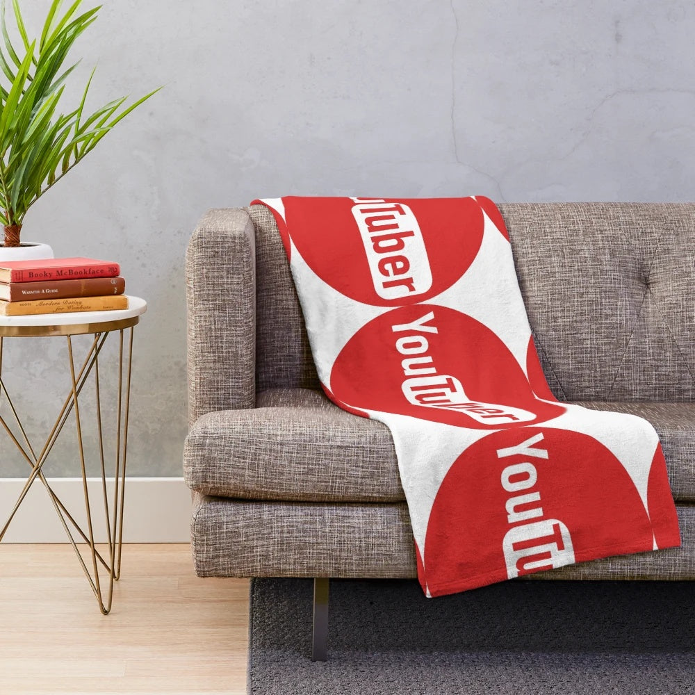 Cozy plush blanket featuring youtube creator design