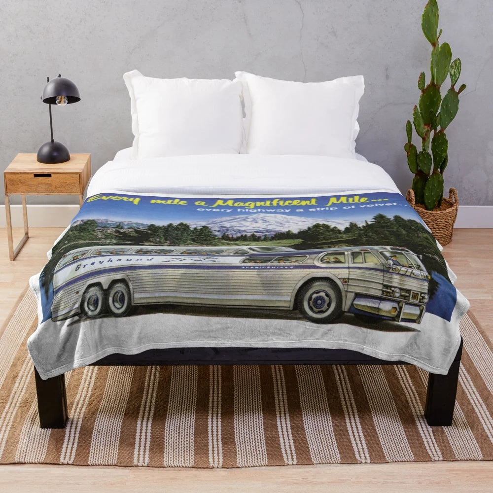 Plush blanket with 1950s bus travel inspired design