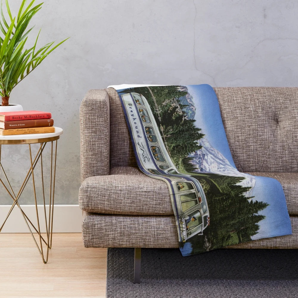 Plush blanket with 1950s bus travel inspired design