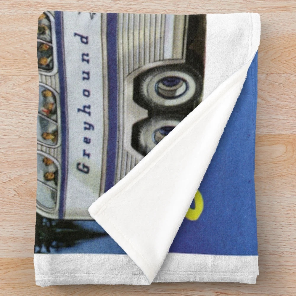 Plush blanket with 1950s bus travel inspired design