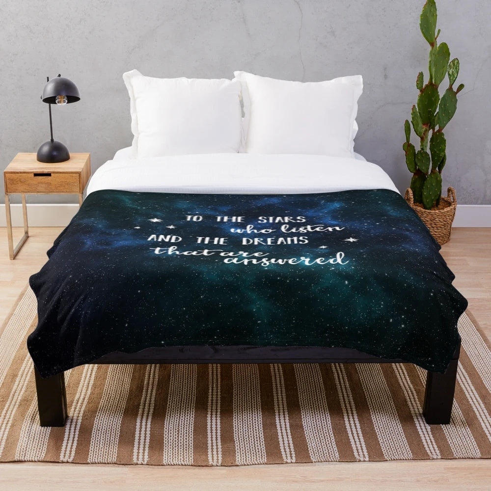 Plush blanket featuring a galaxy and stars design, inspired by the A Court of Thorns and Roses book series