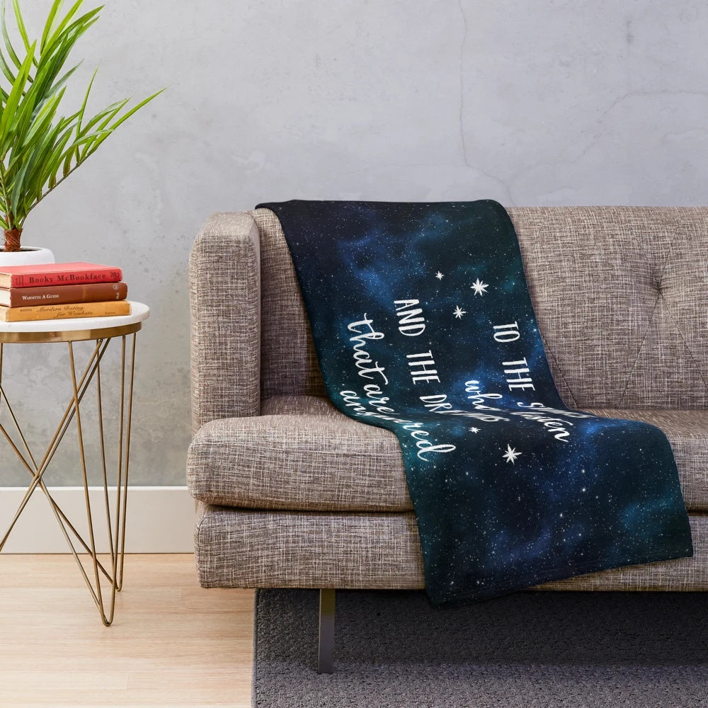 Plush blanket featuring a galaxy and stars design, inspired by the A Court of Thorns and Roses book series