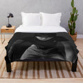 Plush blanket featuring BTS member Jungkook