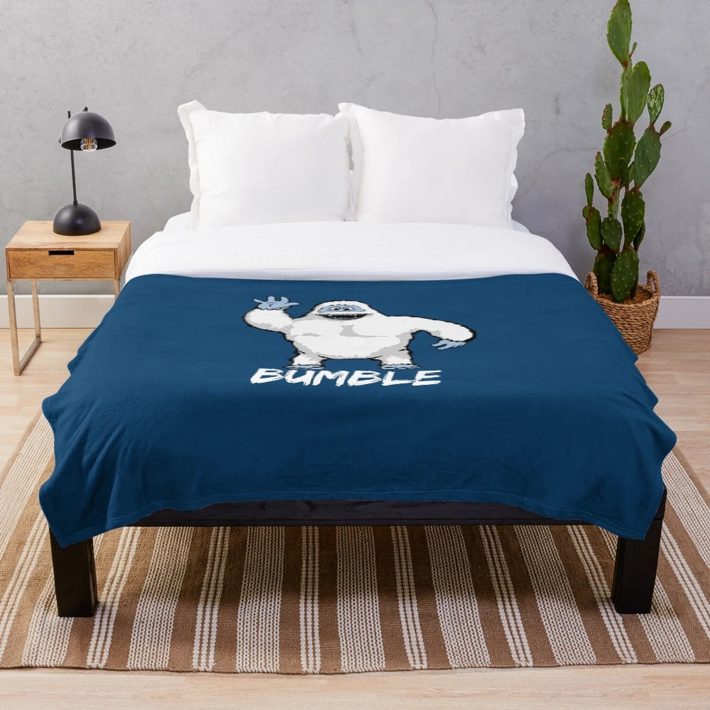 Cozy plush blanket with nostalgic holiday-themed design