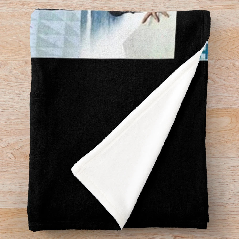 Soft plush blanket featuring a movie-inspired design for cinephiles