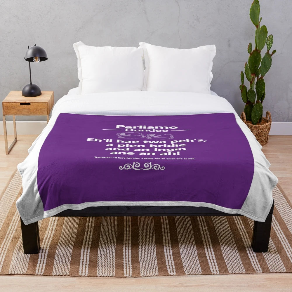 Plush blanket with Dundee accent and cultural elements