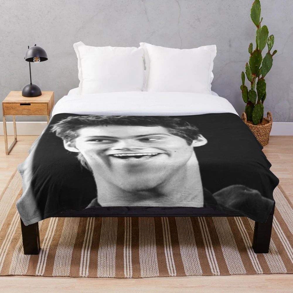 Cozy plush blanket featuring Dylan O'Brien's iconic characters from Teen Wolf and Maze Runner