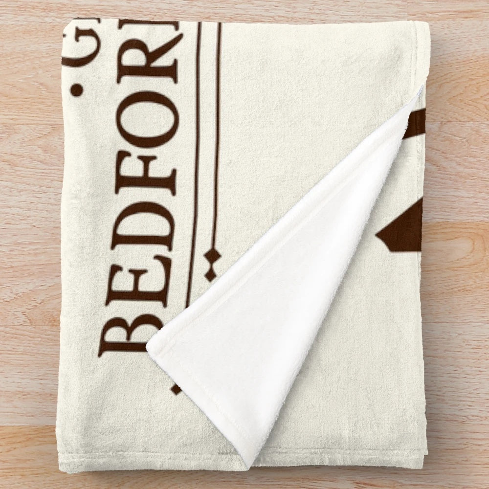 Plush blanket with Bailey Bros Building & Loan logo from the movie "It's a Wonderful Life