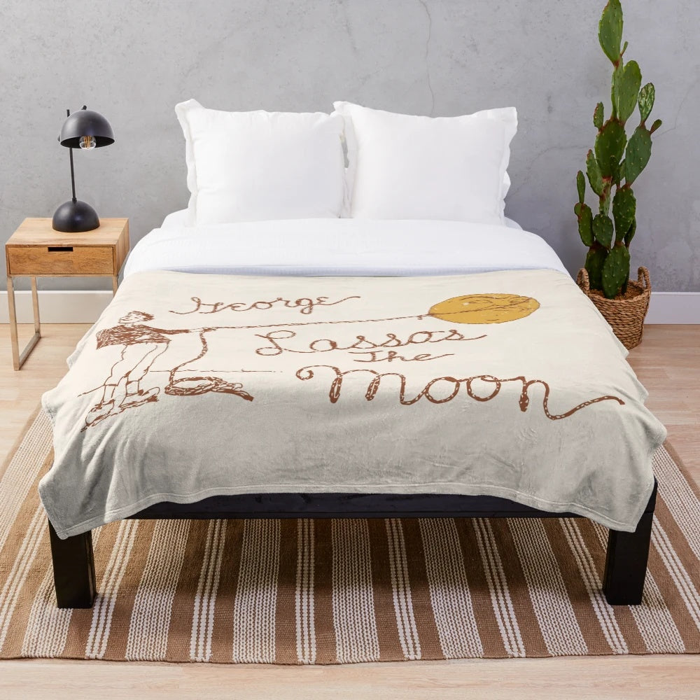 Plush blanket with "It's a Wonderful Life" themed design
