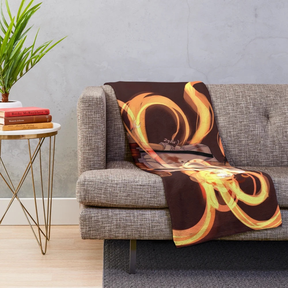 Plush blanket with fire and mythological imagery