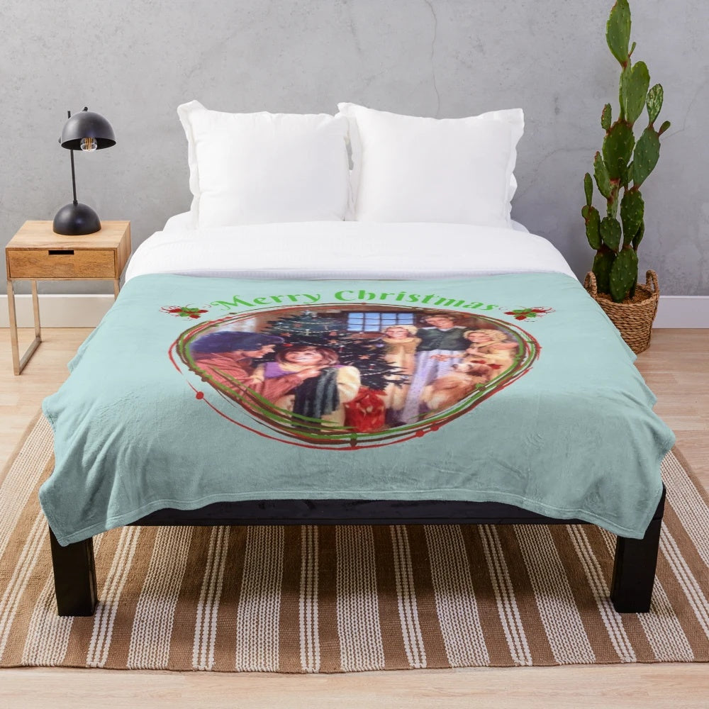 Plush Christmas blanket featuring a scene from "Little House on the Prairie