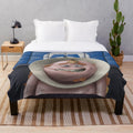 Plush blanket featuring George Sanderson, a character from the classic Monsters Inc. animated film