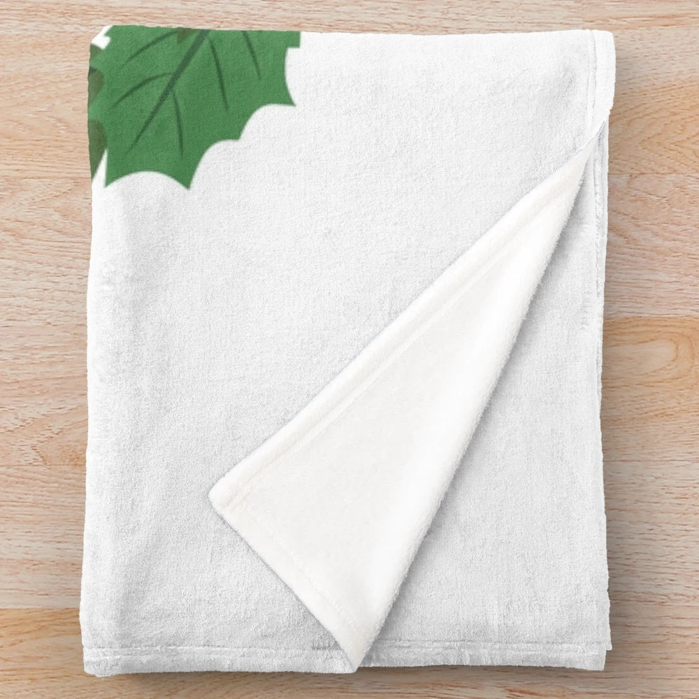 A cozy plush blanket featuring a design inspired by the classic holiday movie National Lampoon's Christmas Vacation