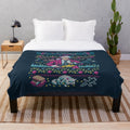 Plush blanket featuring an "ugly" Christmas sweater design inspired by the classic National Lampoon's Vacation movie