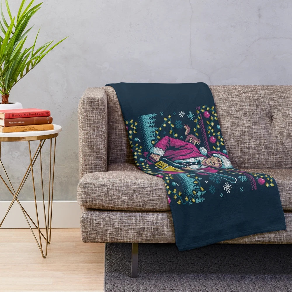 Plush blanket featuring an "ugly" Christmas sweater design inspired by the classic National Lampoon's Vacation movie