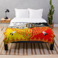 Plush blanket with Native American four directions design