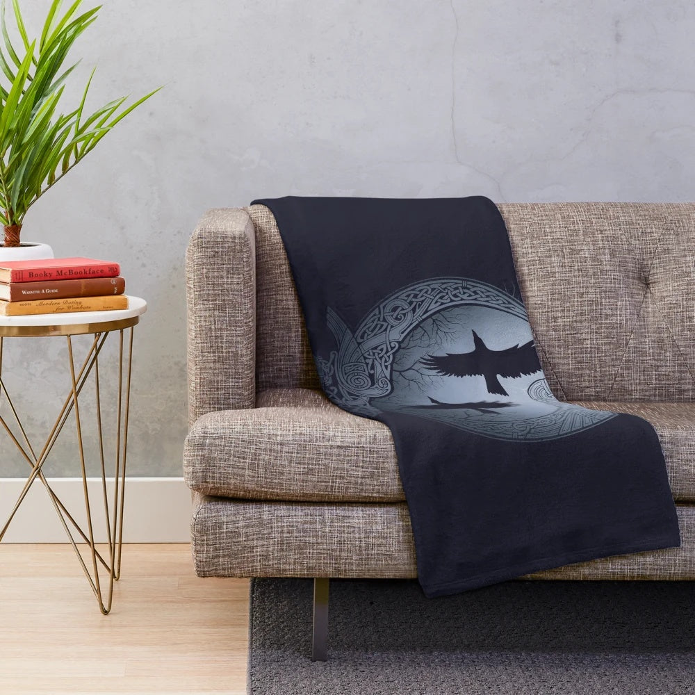 Plush blanket featuring raven design inspired by Nordic mythology