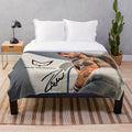 Plush blanket with Raul Alejandro's signature design
