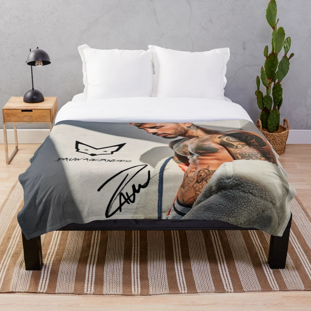 Plush blanket with Raul Alejandro's signature design
