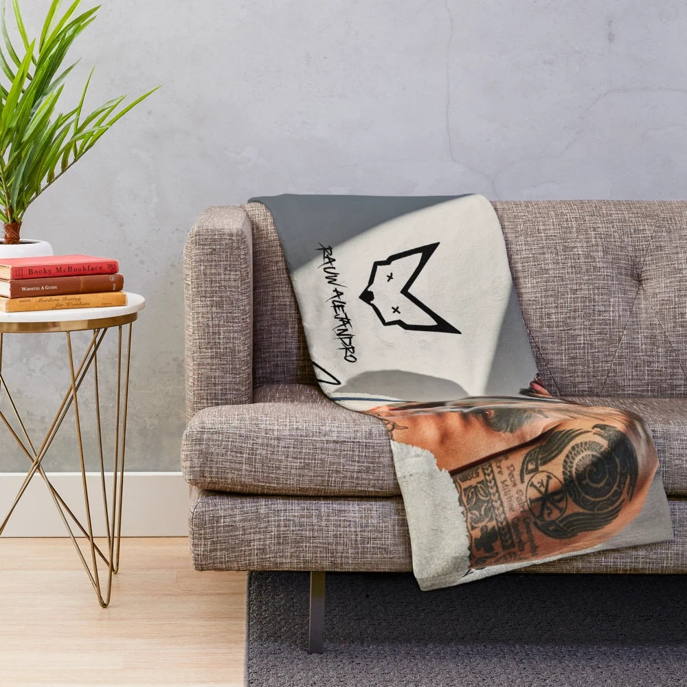 Plush blanket with Raul Alejandro's signature design