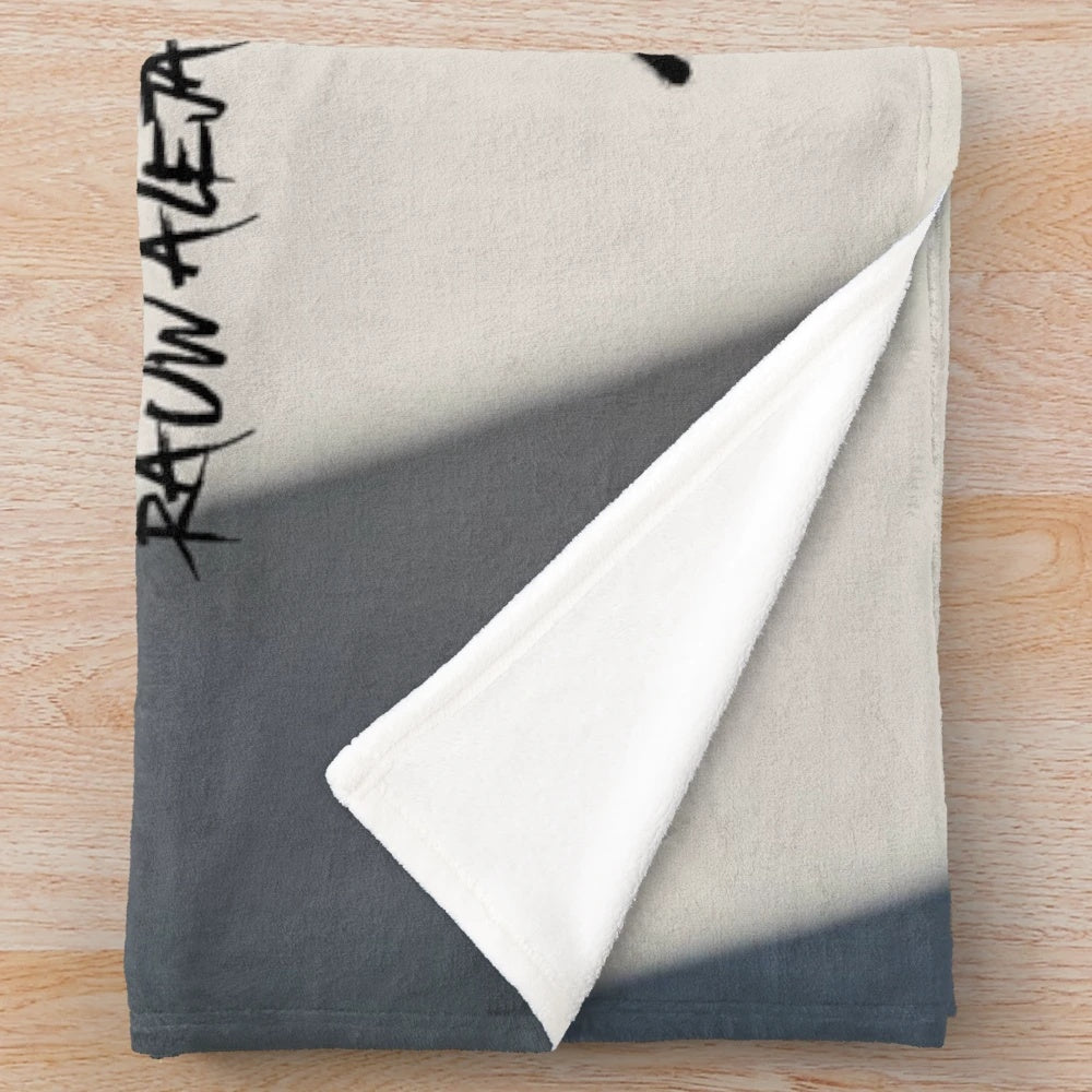 Plush blanket with Raul Alejandro's signature design