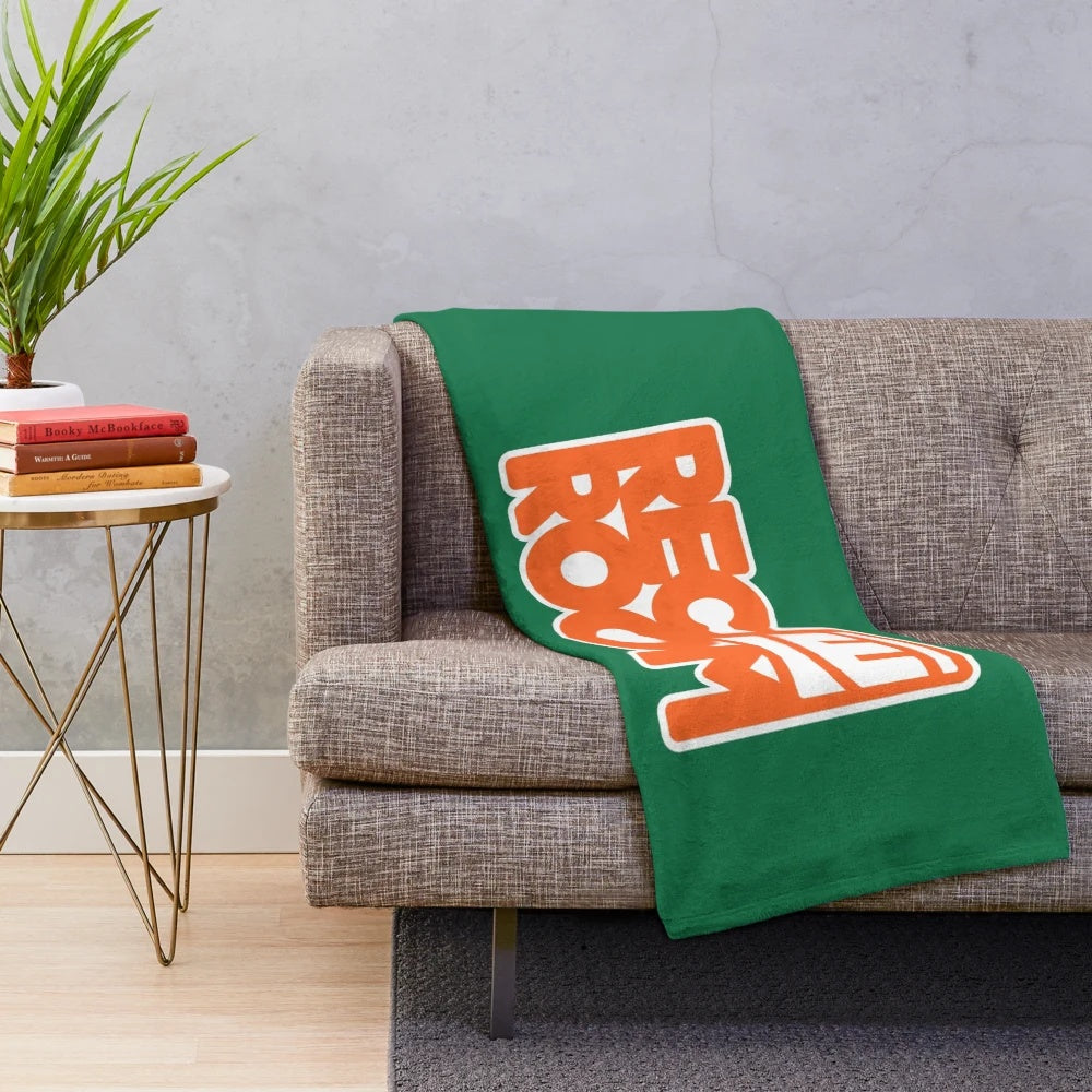Cozy plush blanket with abstract Rec Room-inspired design