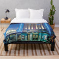 Soft and plush blanket featuring a nighttime scene of the iconic Rio Cinema