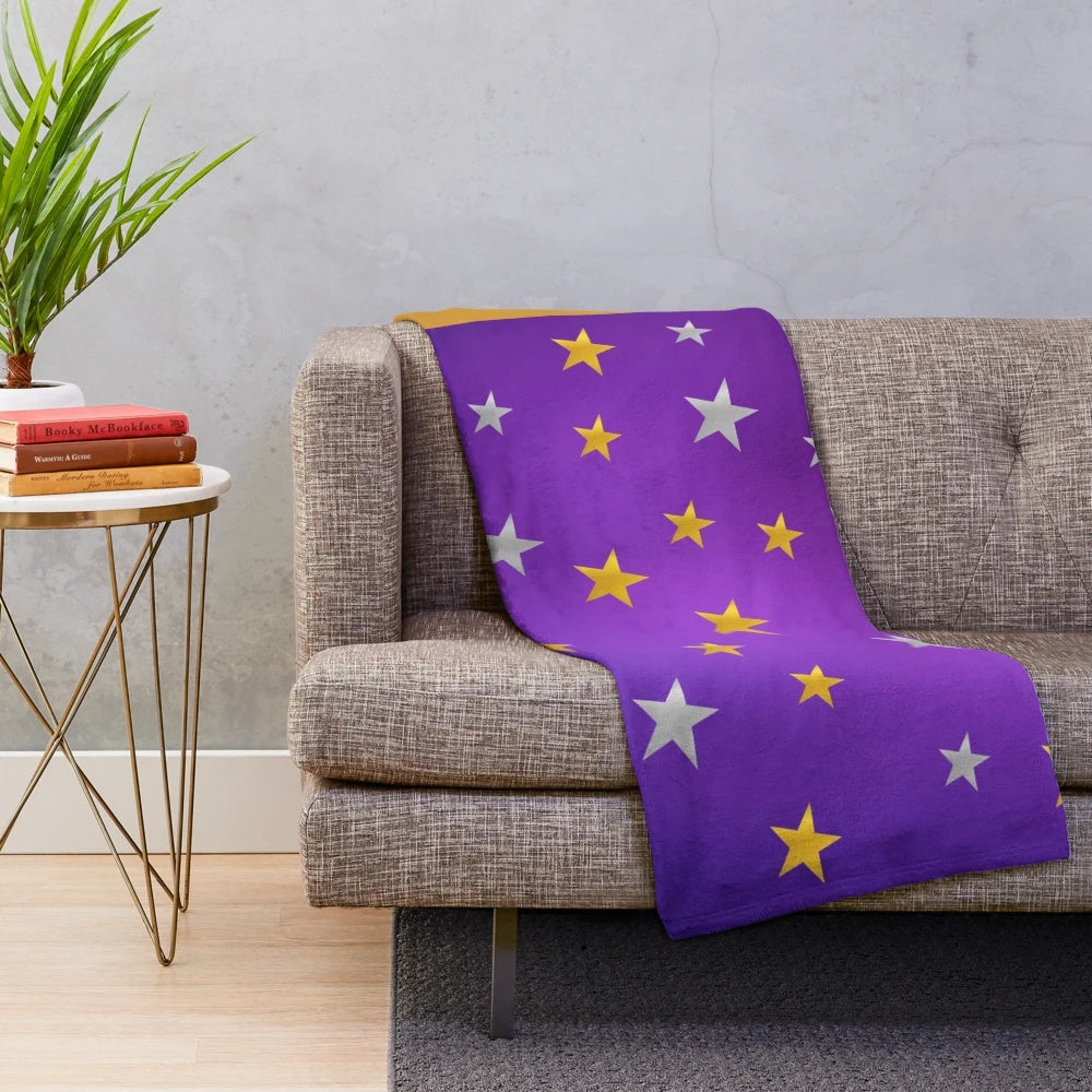 A plush, cozy blanket inspired by the beloved 90s TV series The Big Comfy Couch
