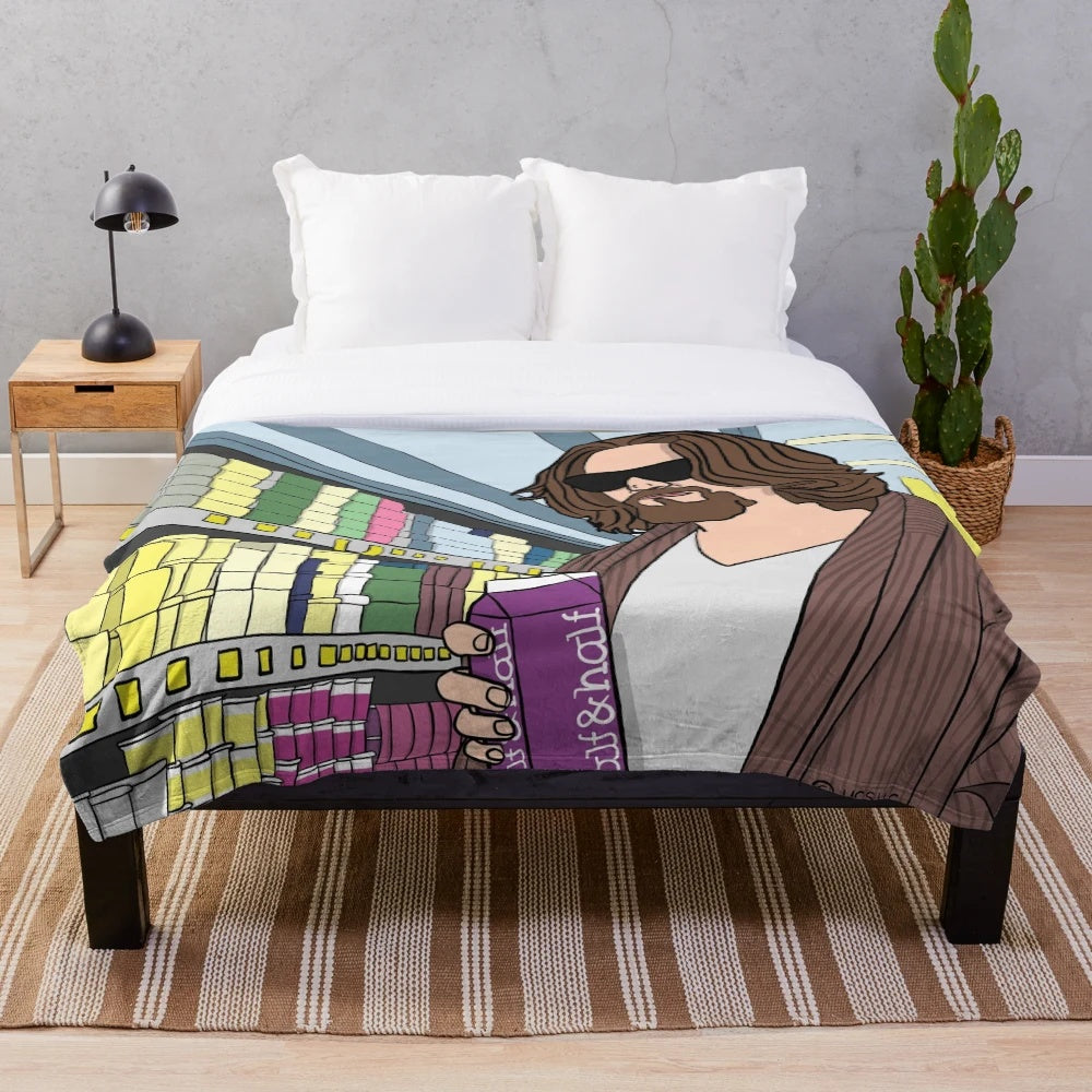 Plush blanket with The Big Lebowski inspired design