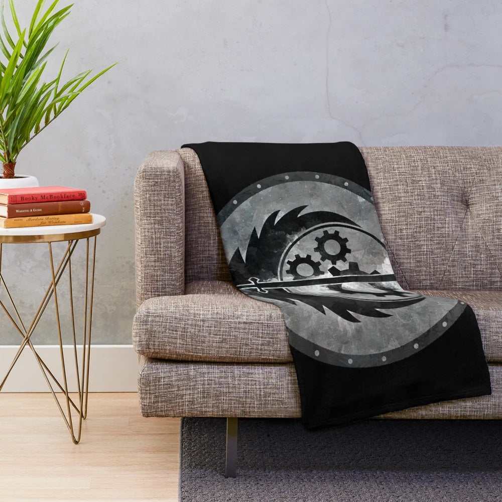 Plush blanket featuring the Brotherhood of Steel insignia from the Fallout video game series